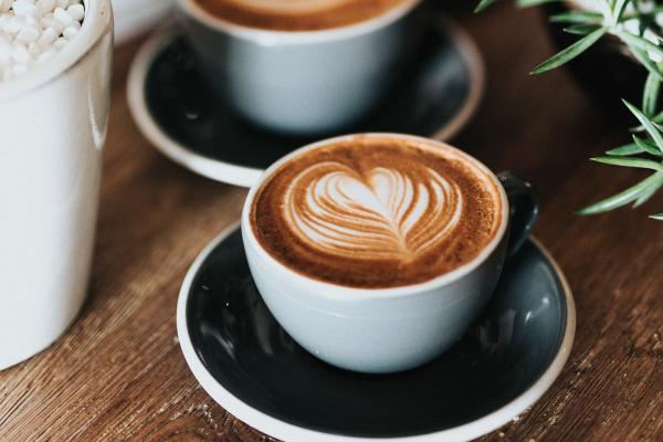 photo of two cups of coffee