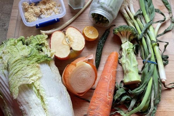 Image of food scraps and leftovers on a chopping board