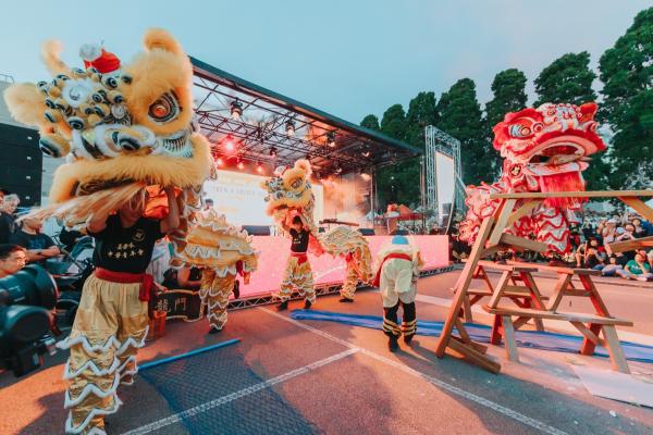 Chinese dragon dancers performing at an outdoor festival