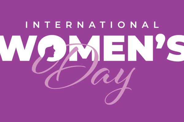 The words International Women's Day on a purple background.