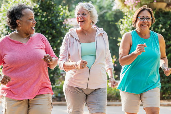 three older ladies exercising outdoors