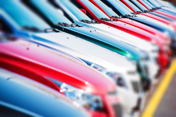 A row of cars of different colours