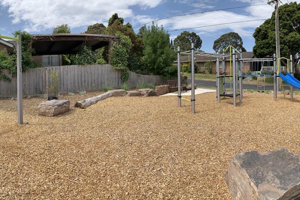 Swing set, tan bark and playground at Gainsborough Reserve 