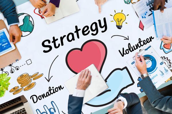 top down image of people work on strategy