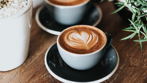 photo of two cups of coffee