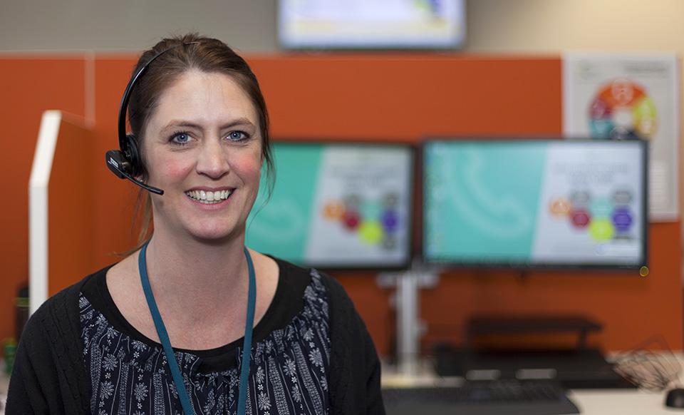 photo of customer service officer wearing headset