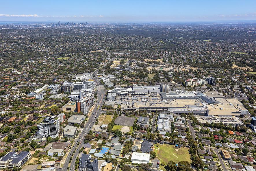 Aerial photograph over Doncaster with apartments and shopping centre