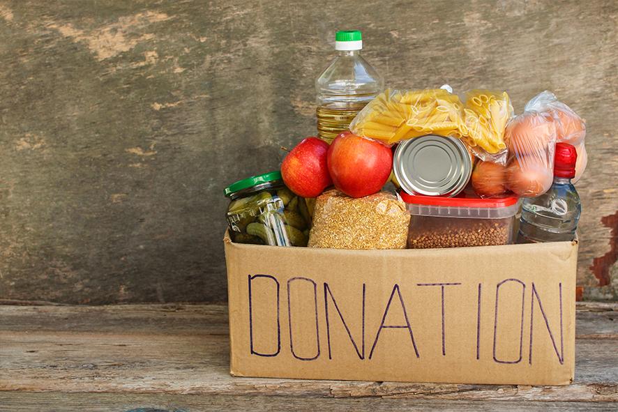 Food bank donations cardboard box of food donations