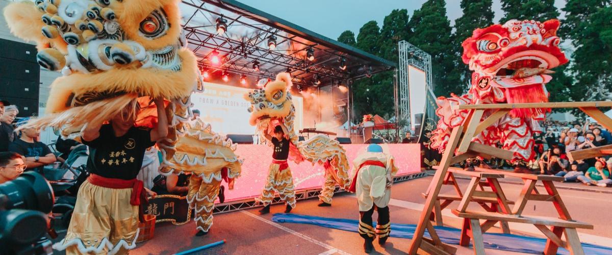 Chinese dragon dancers performing at an outdoor festival