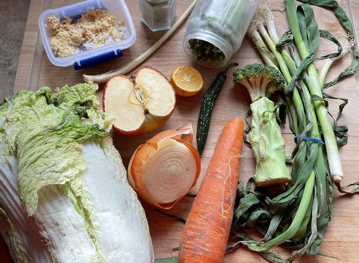 Image of food scraps and leftovers on a chopping board