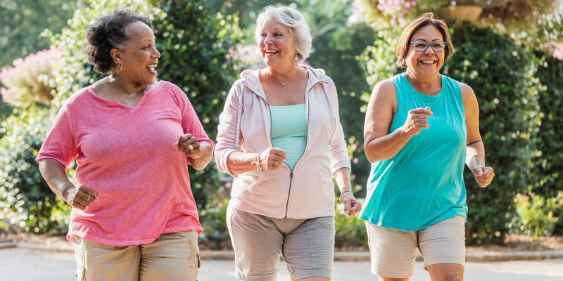 three older ladies exercising outdoors