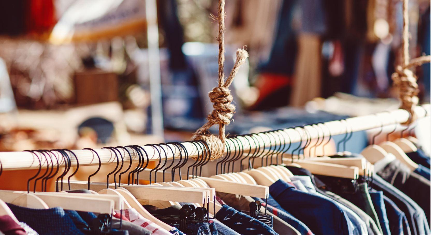 Clothes hanging on a rack at heide Makers Market