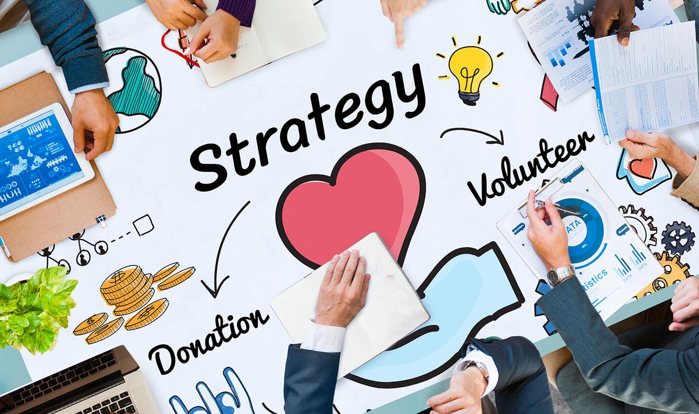 top down image of people work on strategy