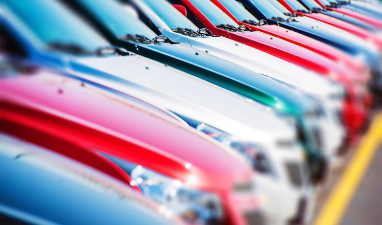 A row of cars of different colours