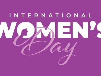 The words International Women's Day on a purple background.