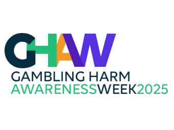 Image shows the words: GHAW - Gambling Harm Awareness Week 2025