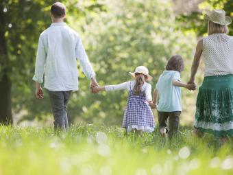 Two girls and two boys playing on playground