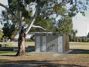 Three toilet cubicles beside a tree at Donvale Reserve