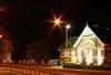 The Doncaster Playhouse heritage building lit up at night on Doncaster Road