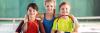 Group of kids with tennis rackets